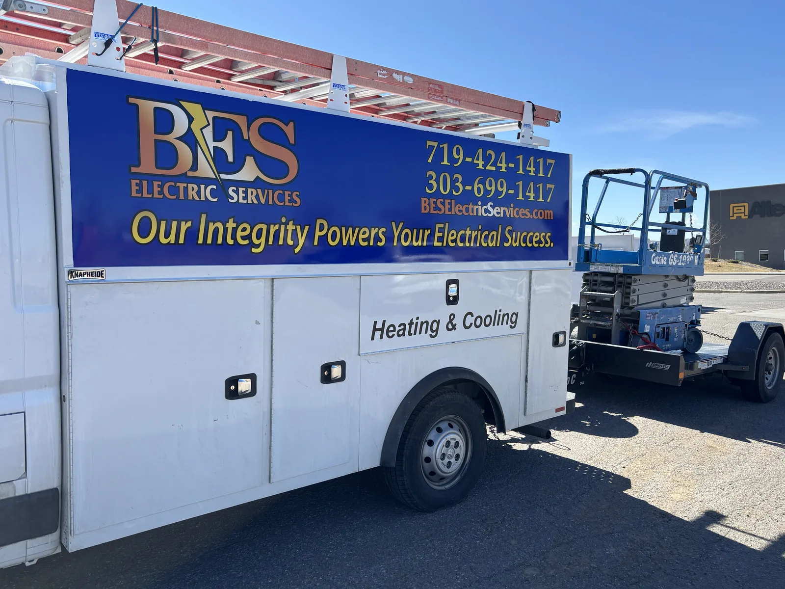 BES service van with "Our Integrity Powers Your Success" tagline